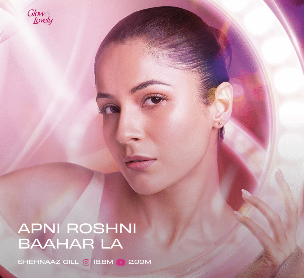 Promotional image for Glow & Lovely featuring a woman with medium skin tone against a pink background, with the Hindi text 'Apni Roshni Baahar La' and social media follower statistics for Shehnaaz Gill displayed